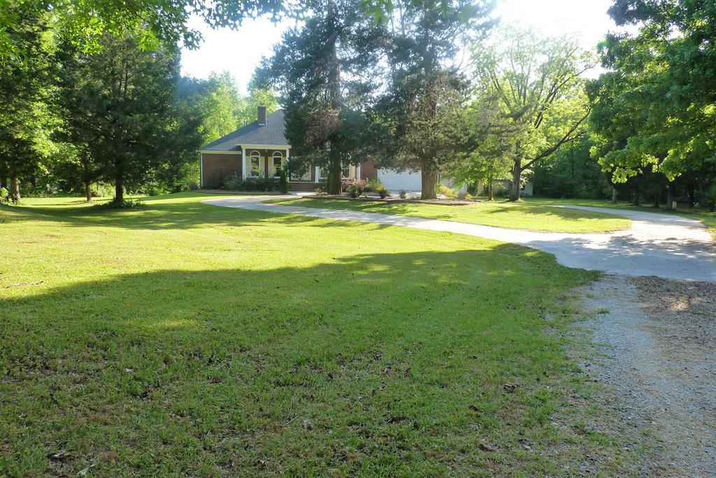 316 Lower Simmons Road Macon, GA 31220 - Photo 33 of 34 a house view with swimming pool in front of it