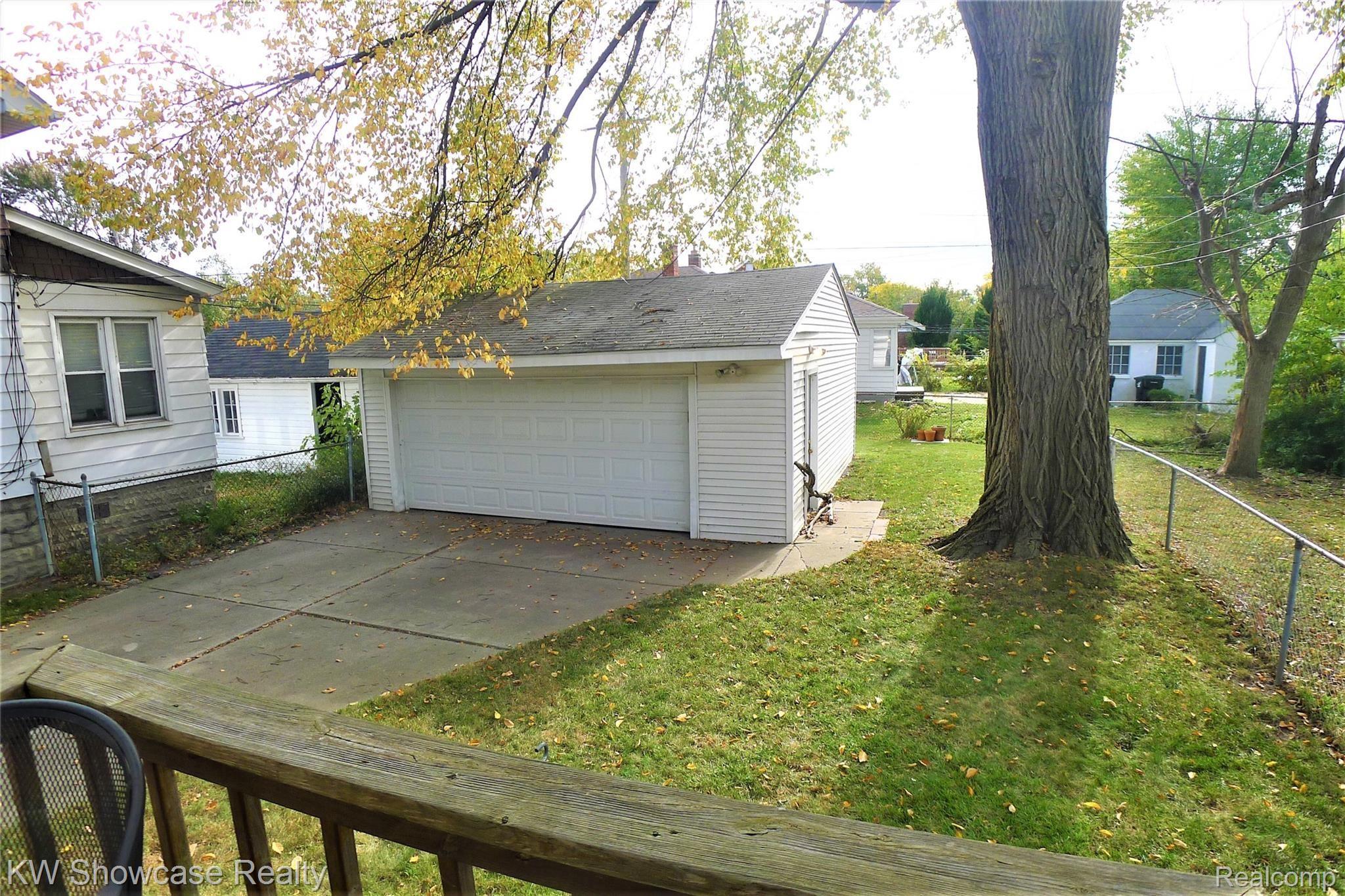 20934 Moross Road Grosse Pointe, MI 48236 - Photo 23 of 31 Large 2.5 Car Garage with side service door.