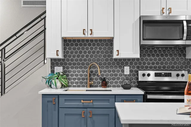 a kitchen with a table and chairs