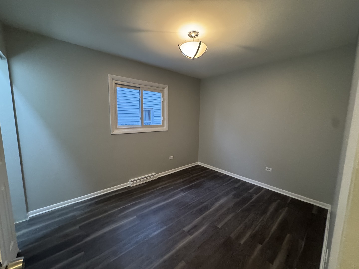 1447 West 114th Place Chicago, IL 60643 - Photo 13 of 21 an empty room with a window