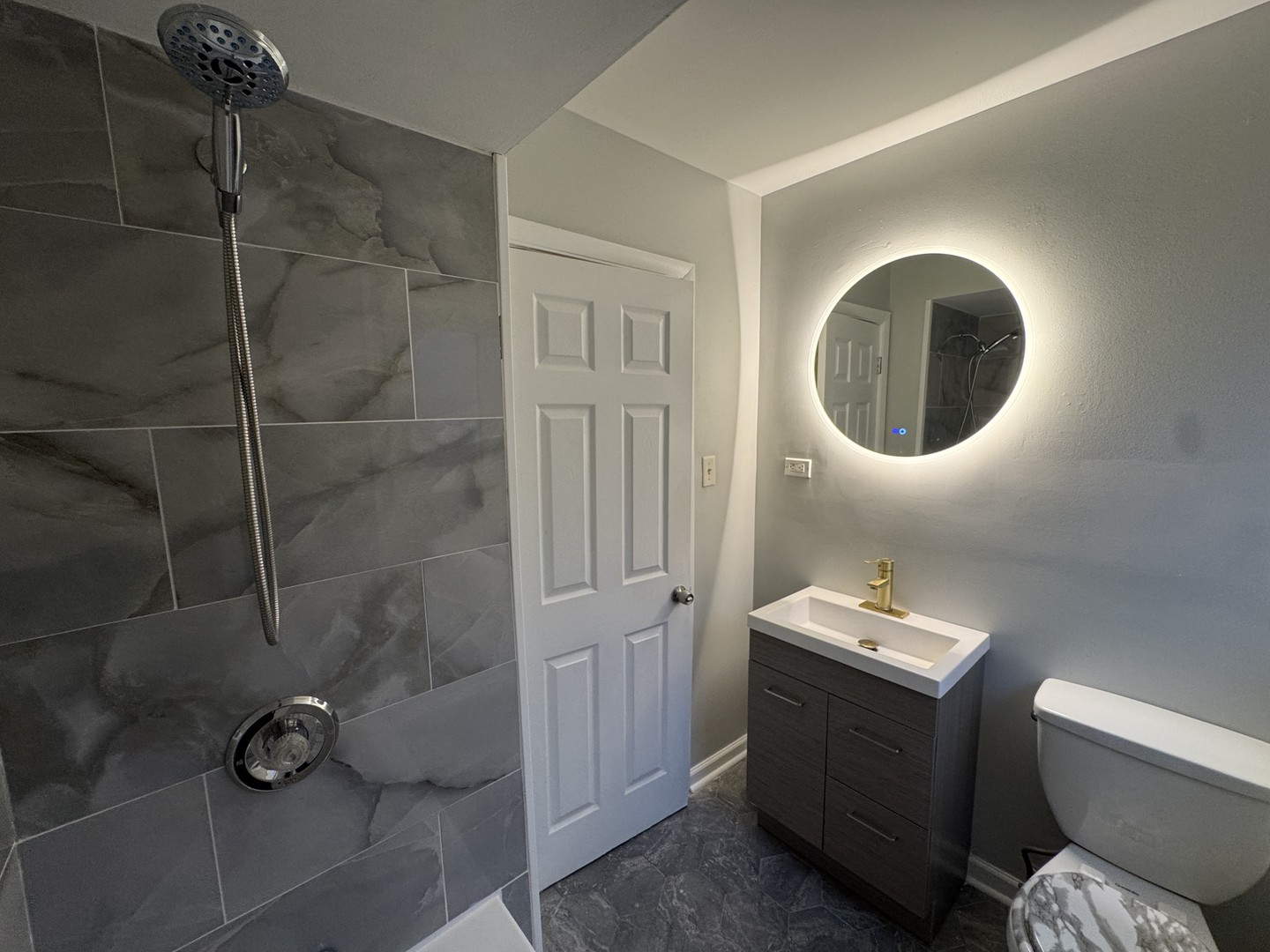 1447 West 114th Place Chicago, IL 60643 - Photo 9 of 21 a bathroom with a toilet and a shower