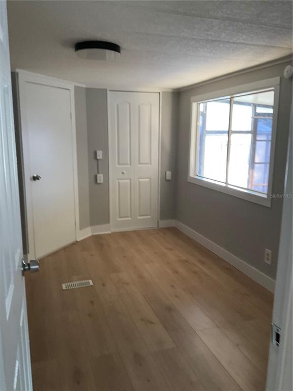 1602 Chobee Street Okeechobee, FL 34974 - Photo 18 of 20 a view of an empty room with a window