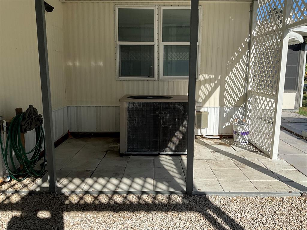 1602 Chobee Street Okeechobee, FL 34974 - Photo 5 of 20 a living room with fireplace