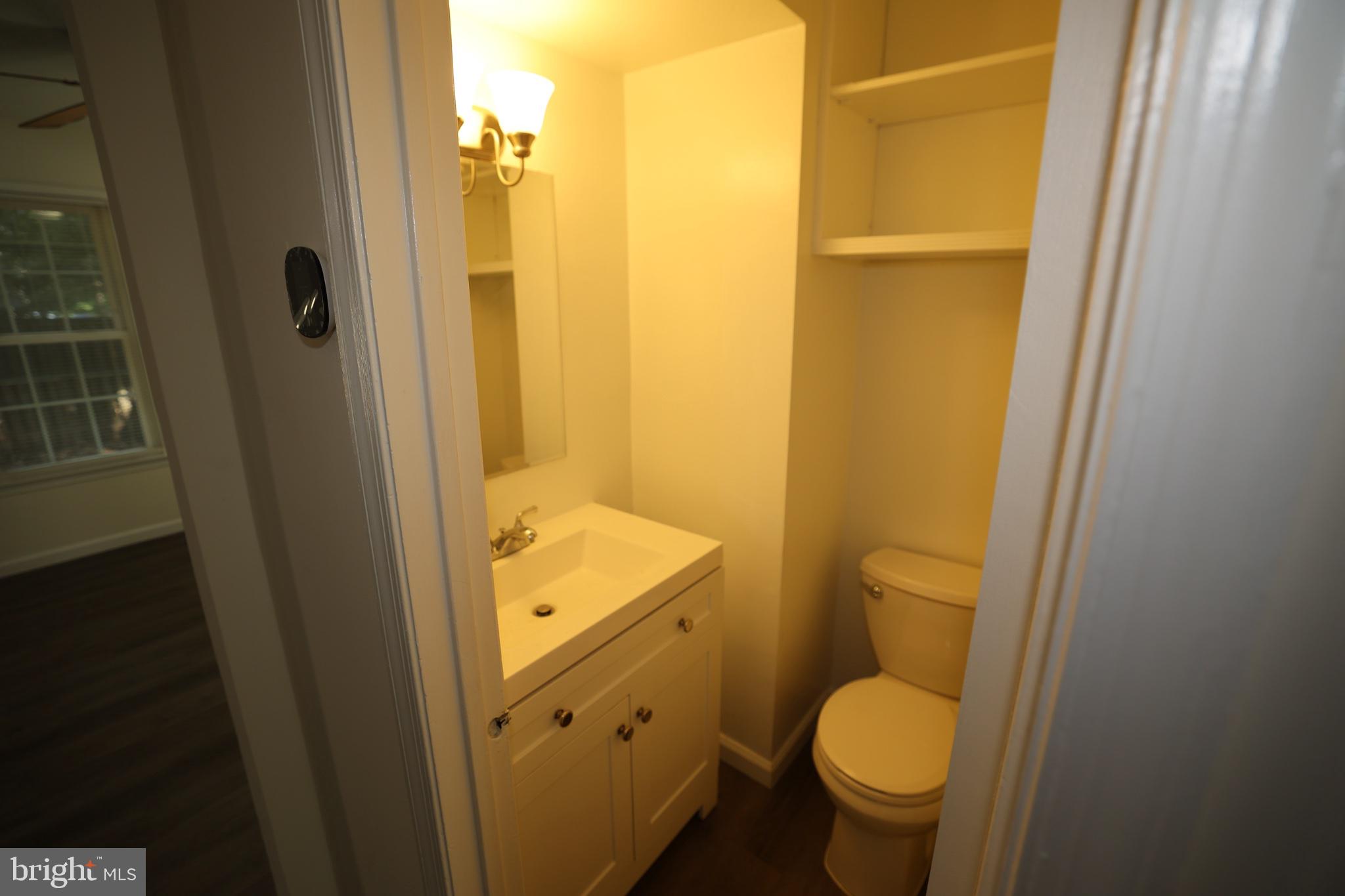 2400 Ansdel Court Reston, VA 20191 - Photo 15 of 19 Cozy bathroom with modern fixtures.