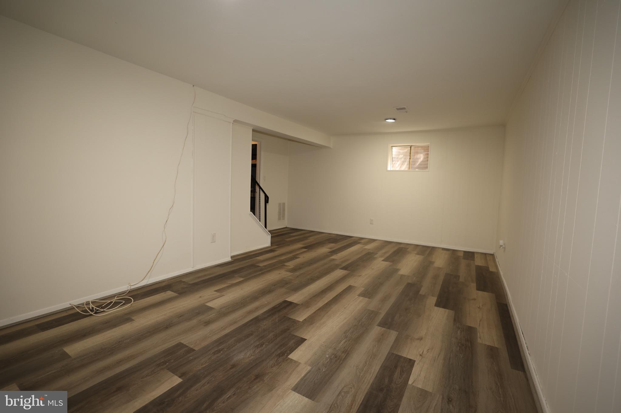 2400 Ansdel Court Reston, VA 20191 - Photo 17 of 19 Spacious, versatile basement retreat.