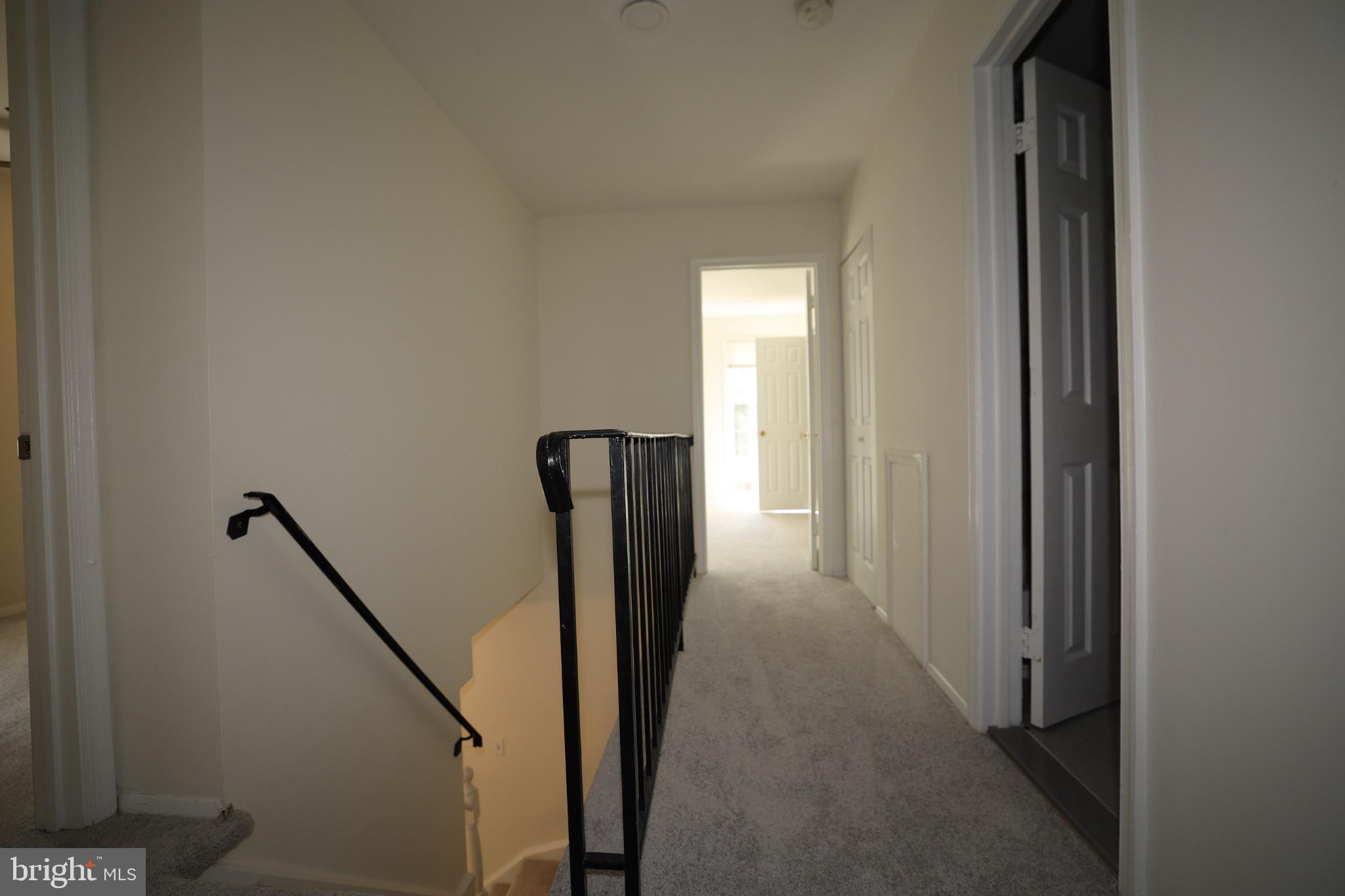 2400 Ansdel Court Reston, VA 20191 - Photo 6 of 19 Bright and inviting upper hallway.