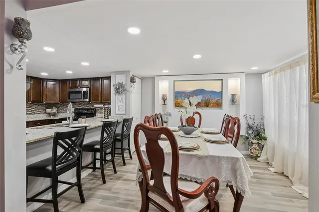 a view of a dining room with furniture