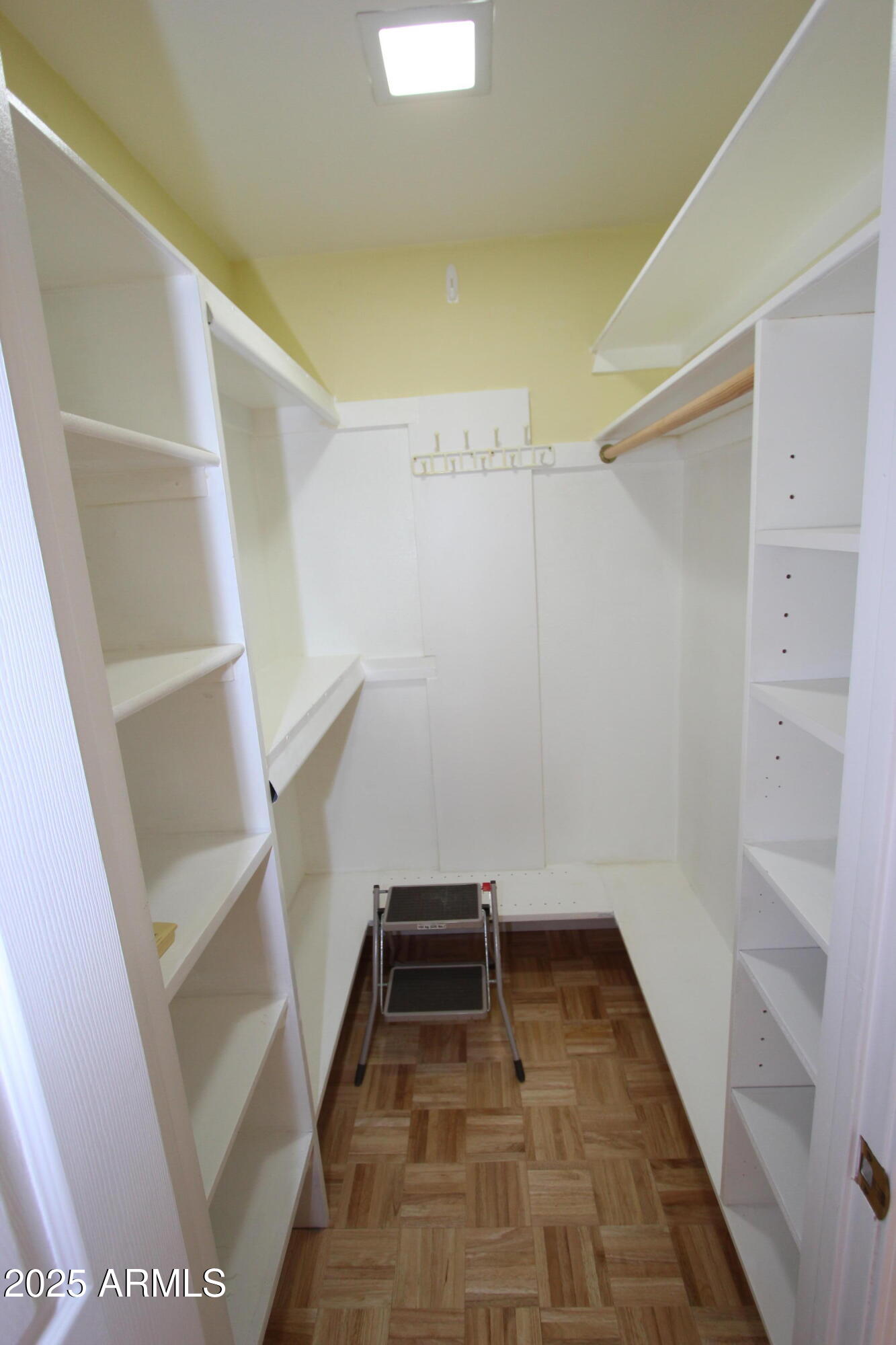 10411 North 11th Avenue, Unit 3 Phoenix, AZ 85021 - Photo 14 of 23 a room with wooden floor and white walls