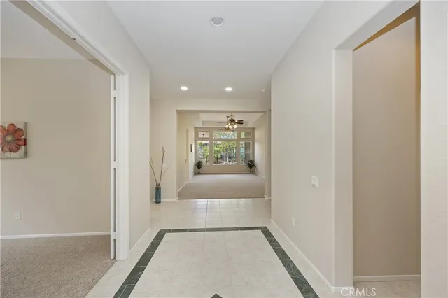 a view of hallway with livingroom