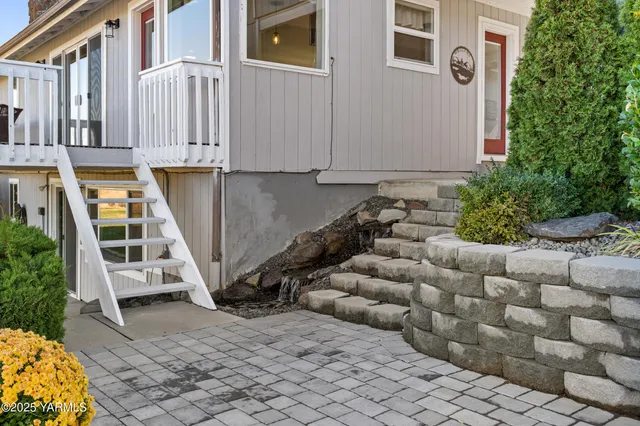 a backyard of a house with lots of green space
