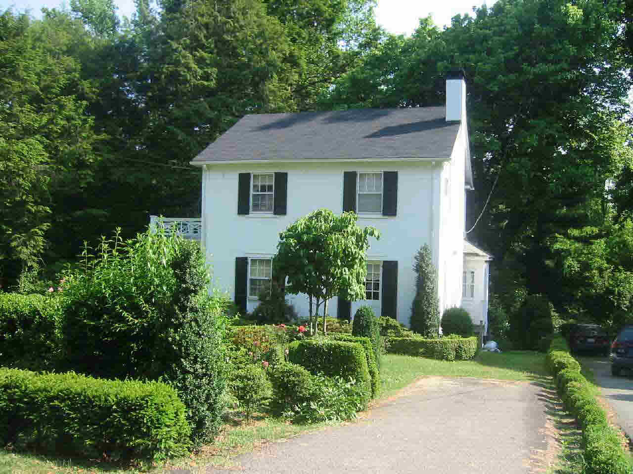 1940 Thomson Road Charlottesville, VA 22903 - Photo 1 of 1 a view of a house with a yard and plants