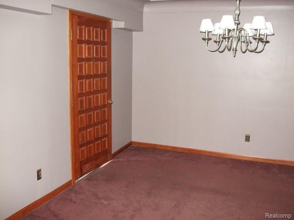 8125 Pelham Road Allen Park, MI 48101 - Photo 12 of 30 FRONT ENTRY DOOR LEADING TO A BONUS ROOM/FOYER.