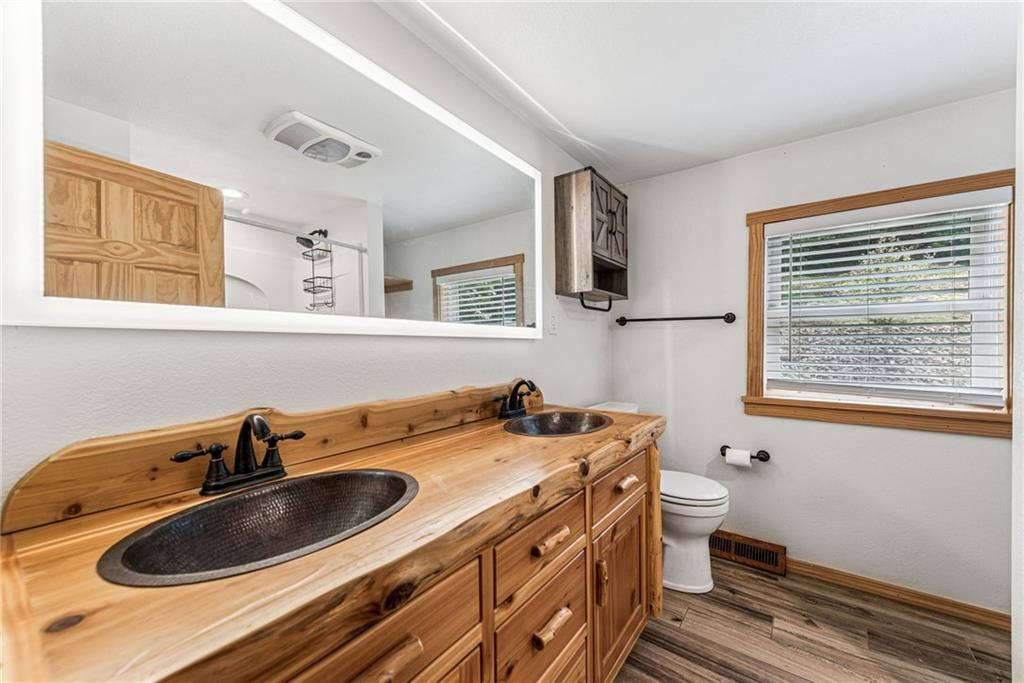 733 McKee Road White Oak, PA 15131 - Photo 22 of 36 a bathroom with a sink and a window