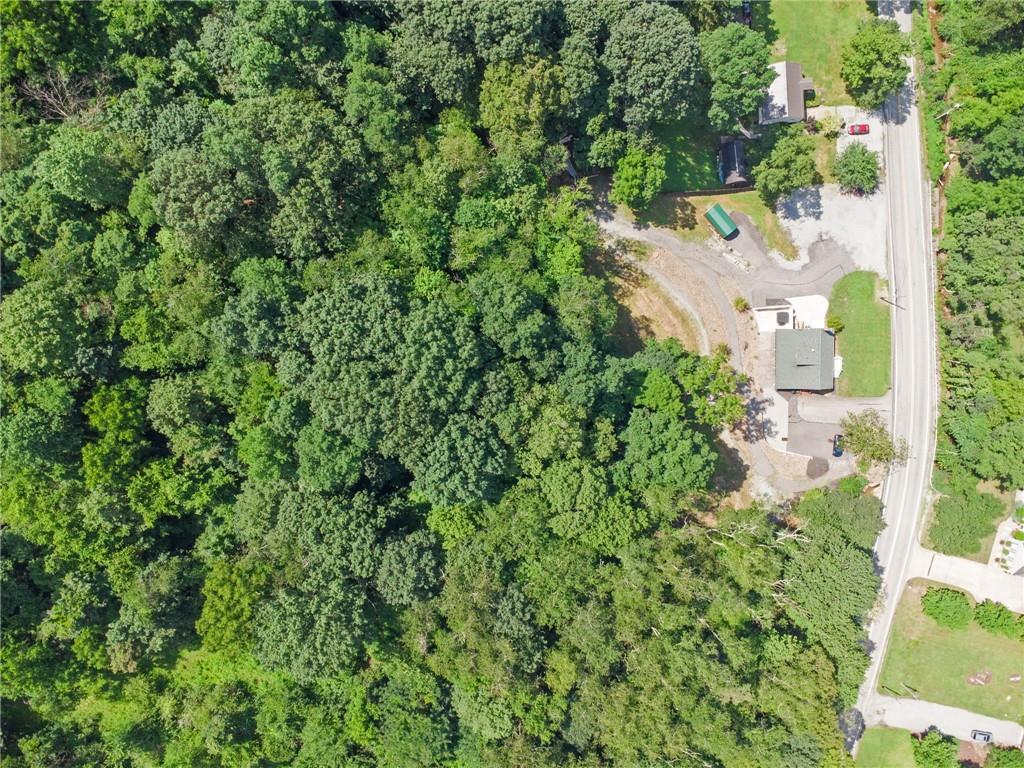 733 McKee Road White Oak, PA 15131 - Photo 34 of 36 an aerial view of residential house with outdoor space and trees all around