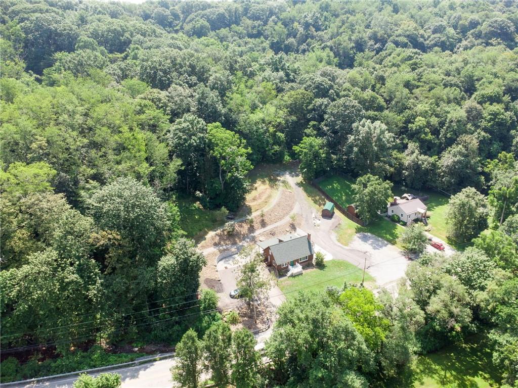 733 McKee Road White Oak, PA 15131 - Photo 35 of 36 an aerial view of residential house with outdoor space and trees all around
