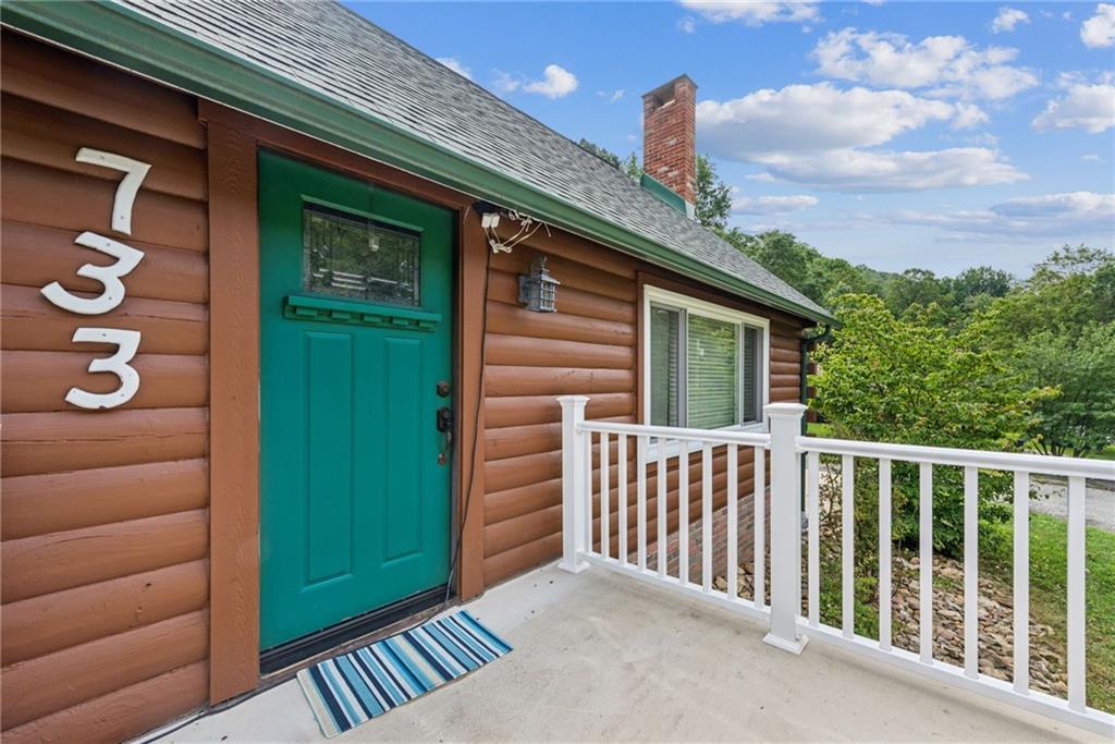 733 McKee Road White Oak, PA 15131 - Photo 5 of 36 a view of a house with a deck
