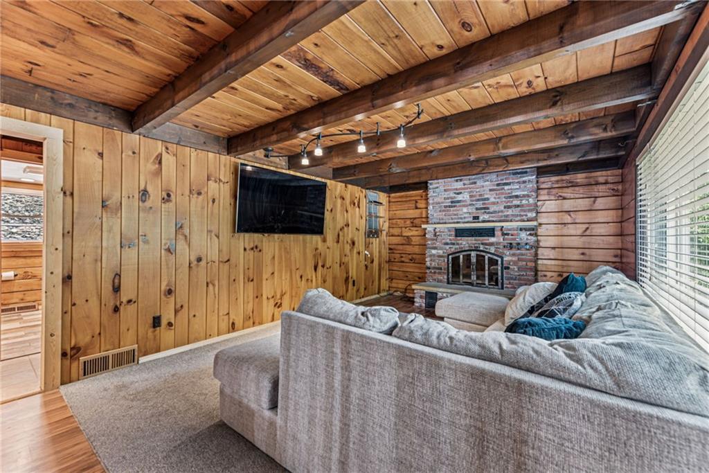 733 McKee Road White Oak, PA 15131 - Photo 6 of 36 a living room with furniture and a flat screen tv