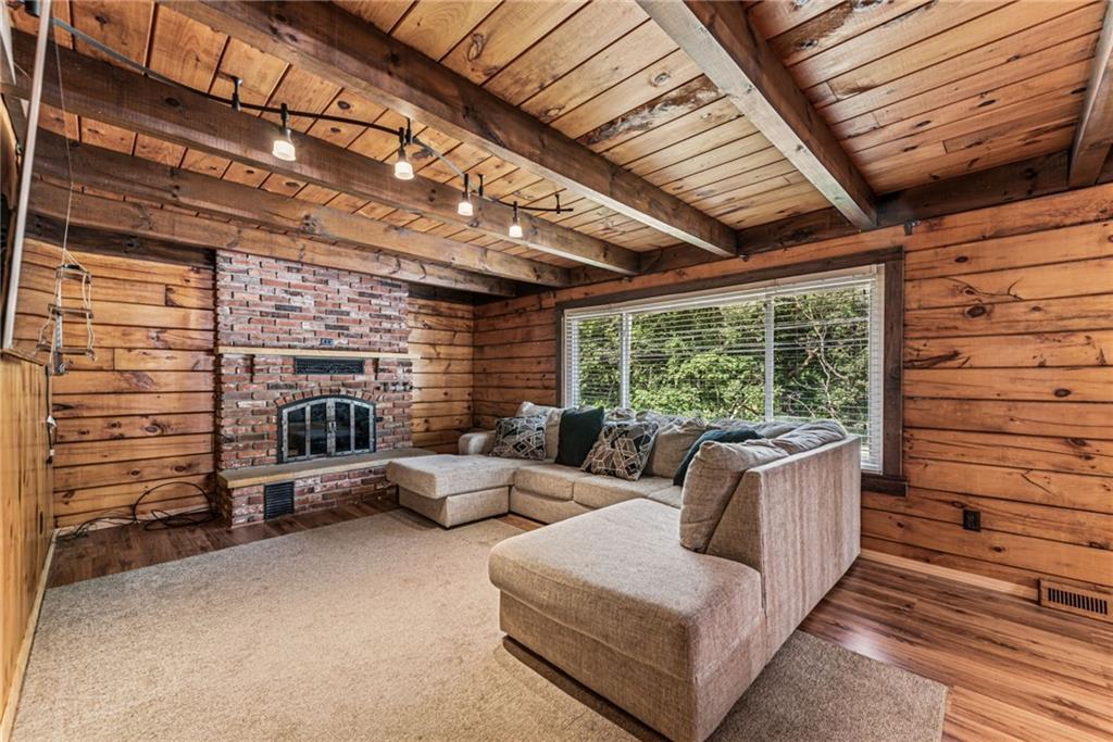 733 McKee Road White Oak, PA 15131 - Photo 8 of 36 a living room with furniture and a large window