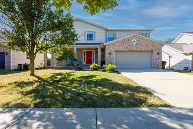 a front view of house with yard