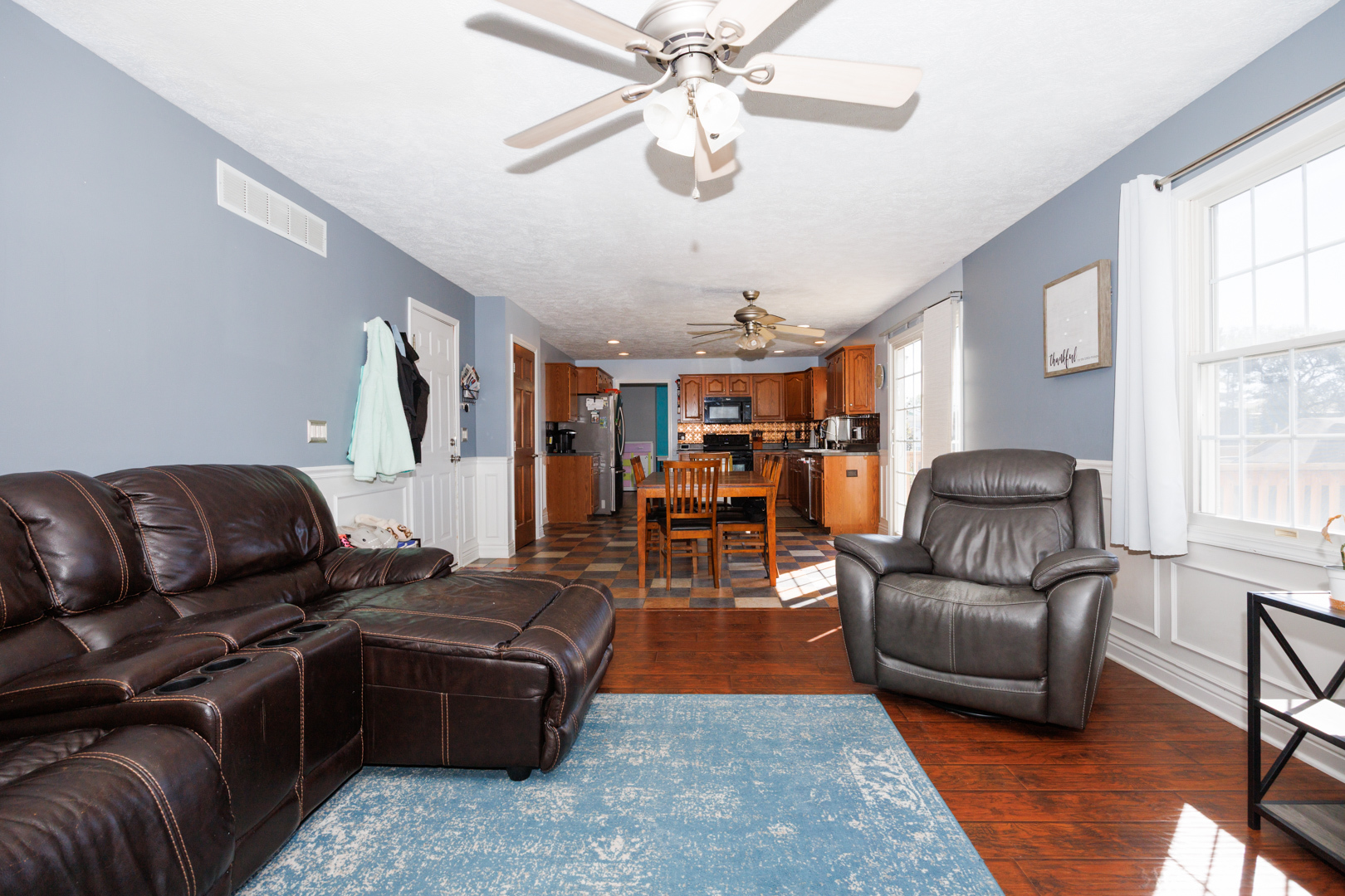 2405 Savanna Road Bloomington, IL 61705 - Photo 11 of 48 a living room with furniture ceiling fan and a window