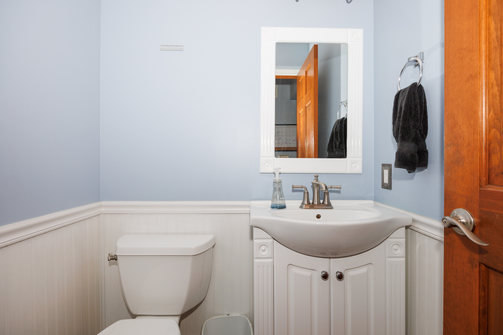 2405 Savanna Road Bloomington, IL 61705 - Photo 18 of 48 a bathroom with a toilet sink and mirror