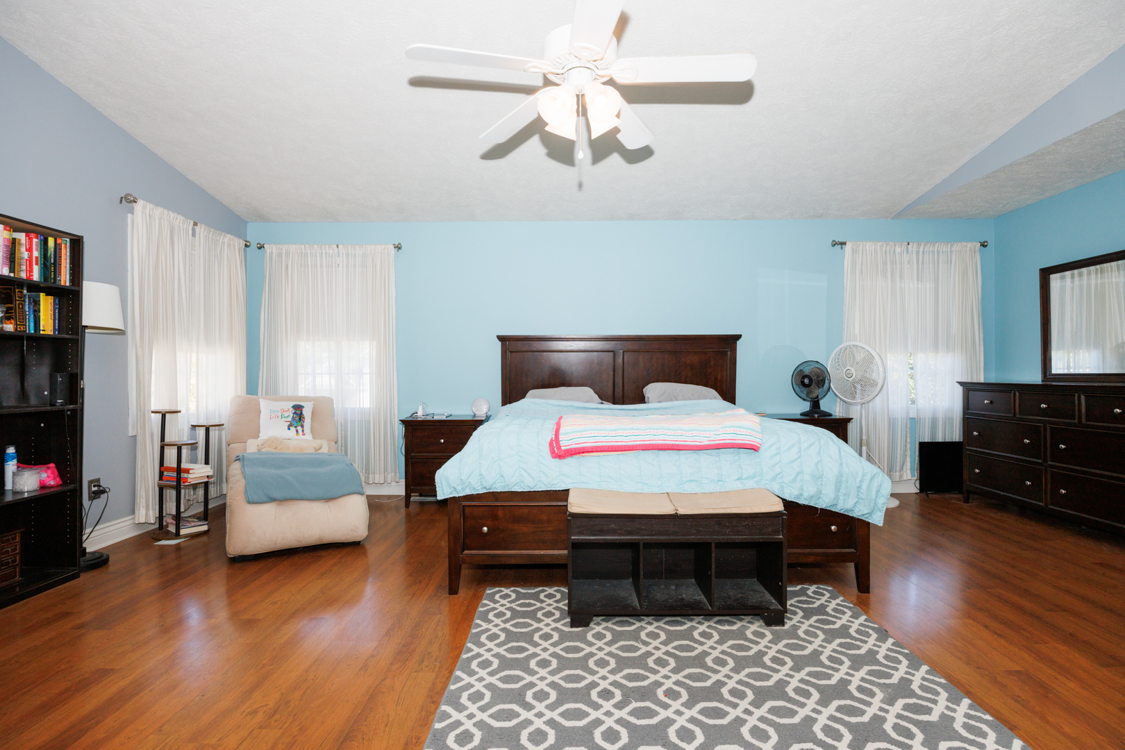 2405 Savanna Road Bloomington, IL 61705 - Photo 20 of 48 a bedroom with a bed and wooden floor