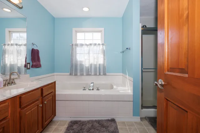 a bathroom with a sink and a bathtub