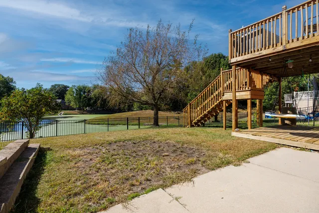 a view of a backyard with sitting area