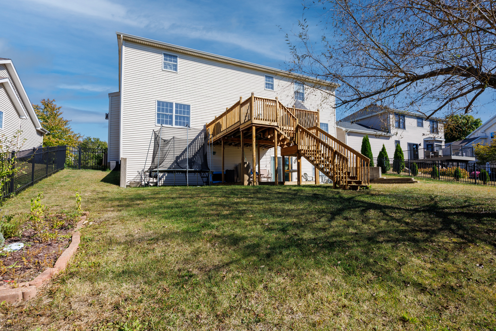 2405 Savanna Road Bloomington, IL 61705 - Photo 44 of 48 a view of a big room with a big yard and large tree