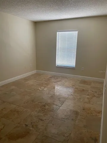 a view of an empty room with window