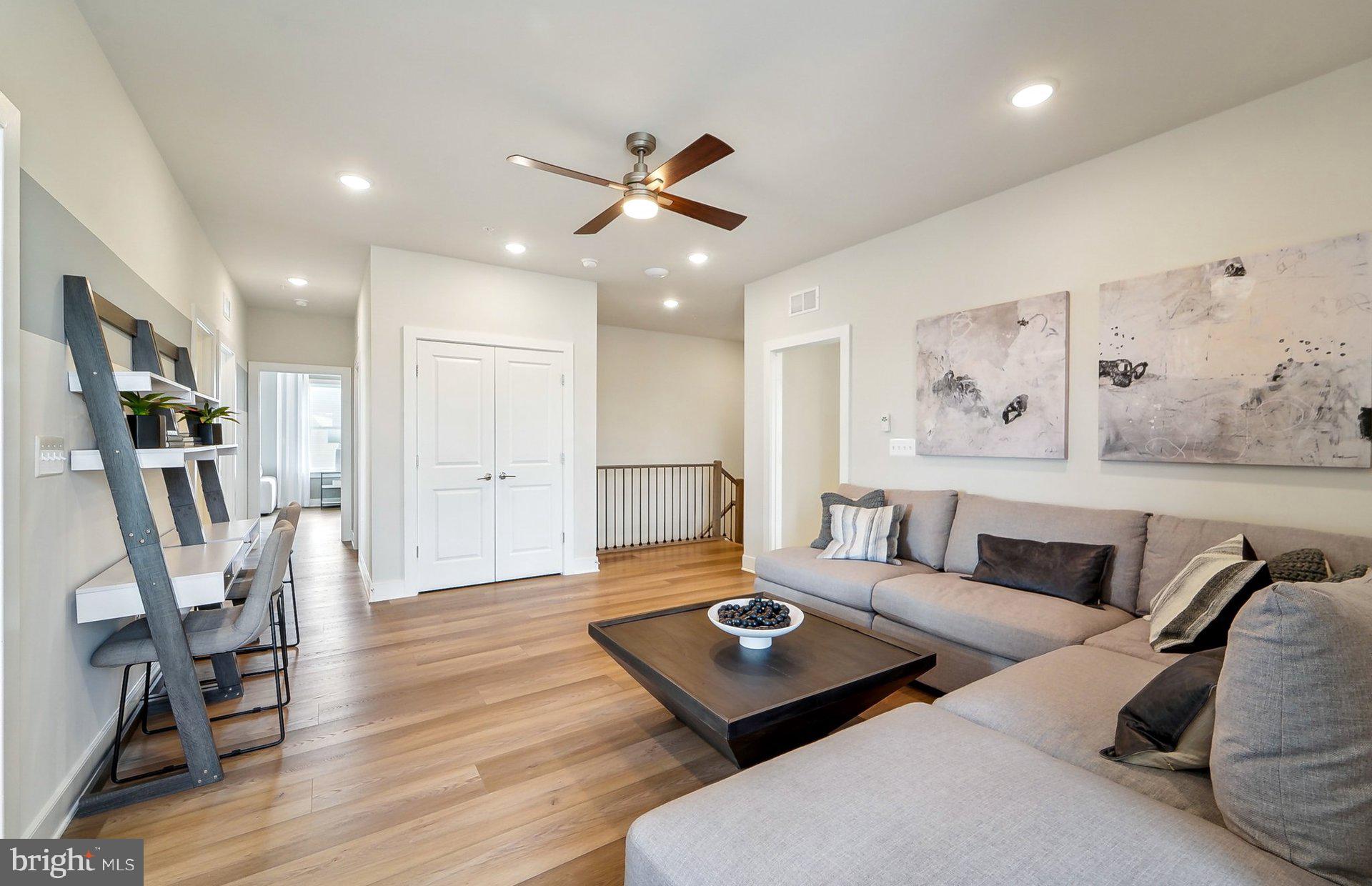 22513 Sculpin Brk Road Boyds, MD 20841 - Photo 20 of 53 a living room with furniture and a rug