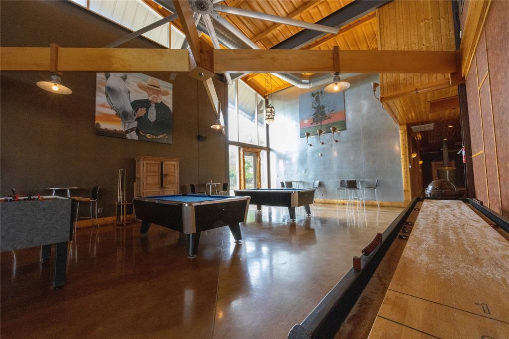 51 D Hensley Road Gordon, TX 76453 - Photo 16 of 29 a lobby with furniture and wooden floor