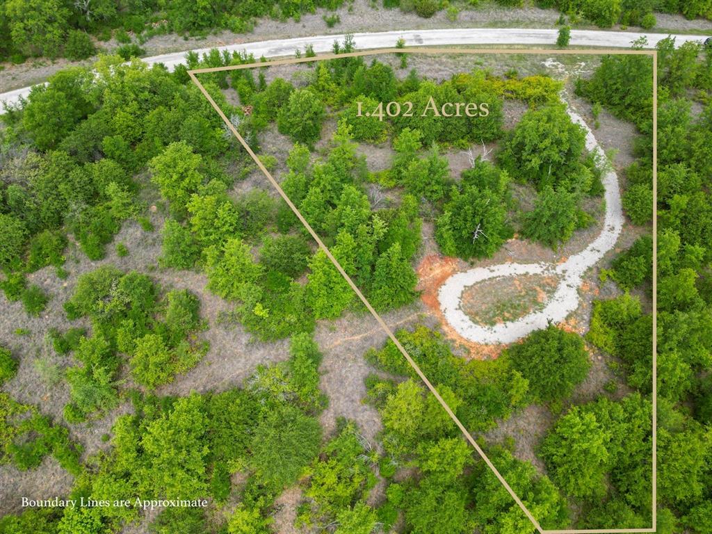 51 D Hensley Road Gordon, TX 76453 - Photo 2 of 29 a backyard of a house with lots of green space