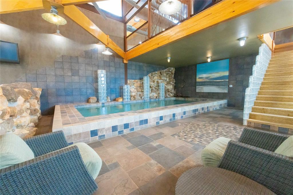 51 D Hensley Road Gordon, TX 76453 - Photo 24 of 29 a living room with furniture and a fireplace