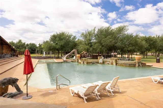 a view of a lake with a house