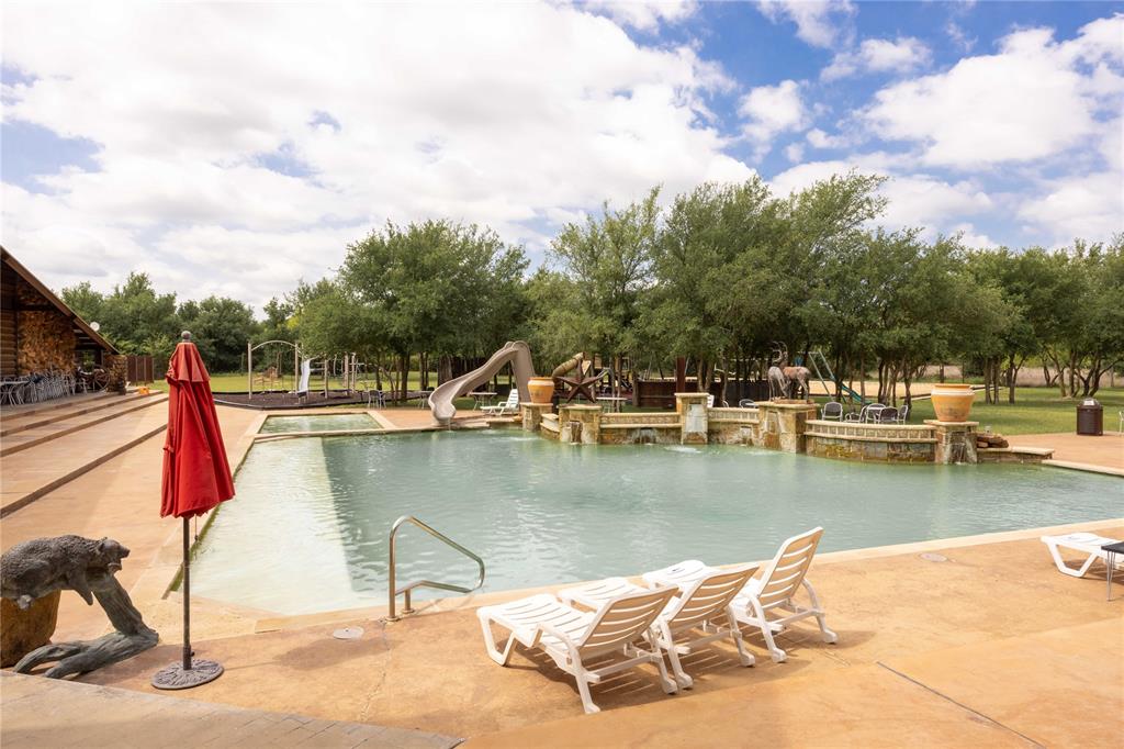 51 D Hensley Road Gordon, TX 76453 - Photo 26 of 29 a view of a lake with a house