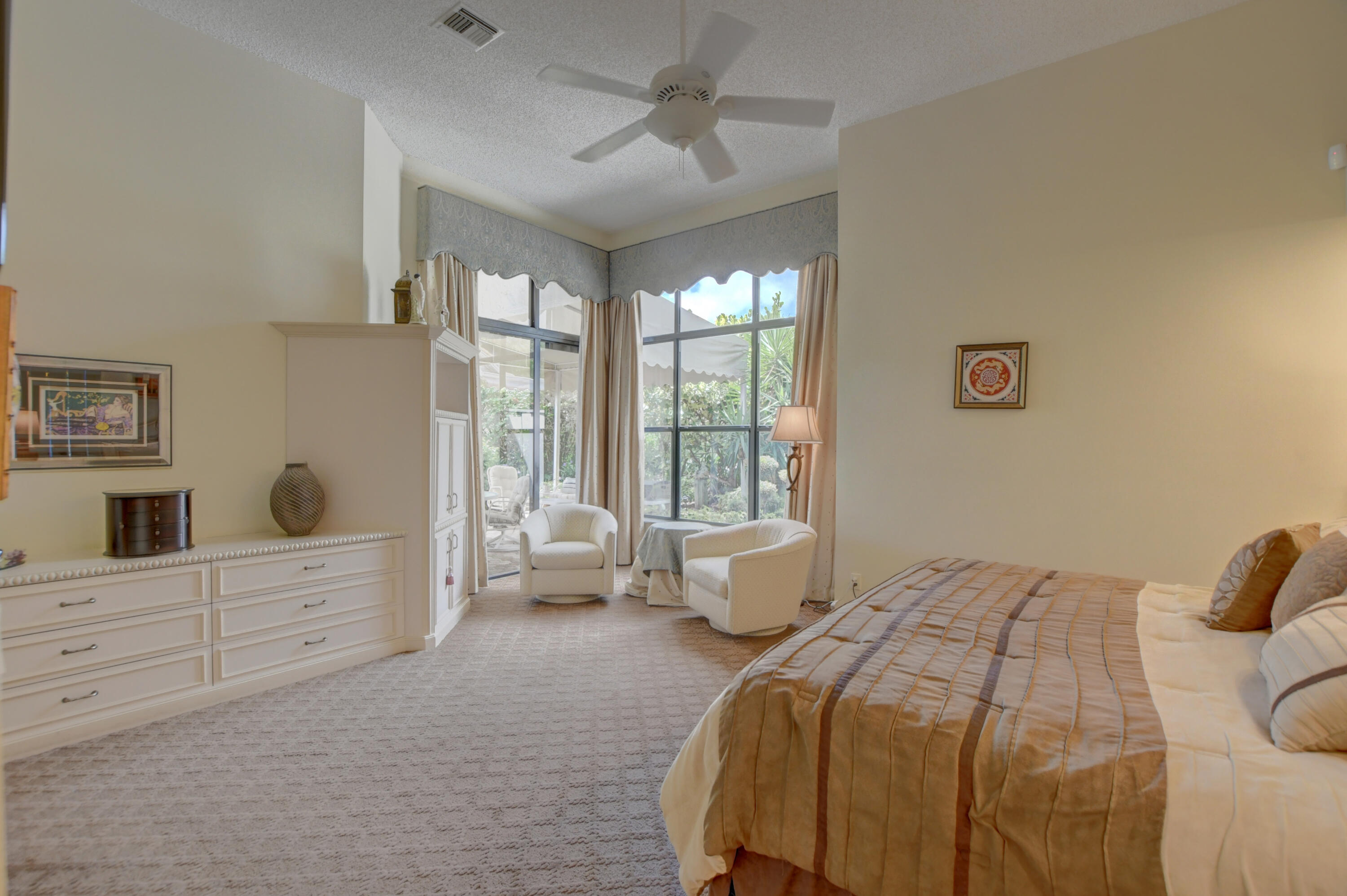 2424 Northwest 63rd Street Boca Raton, FL 33496 - Photo 25 of 35 primary bedroom built in storage