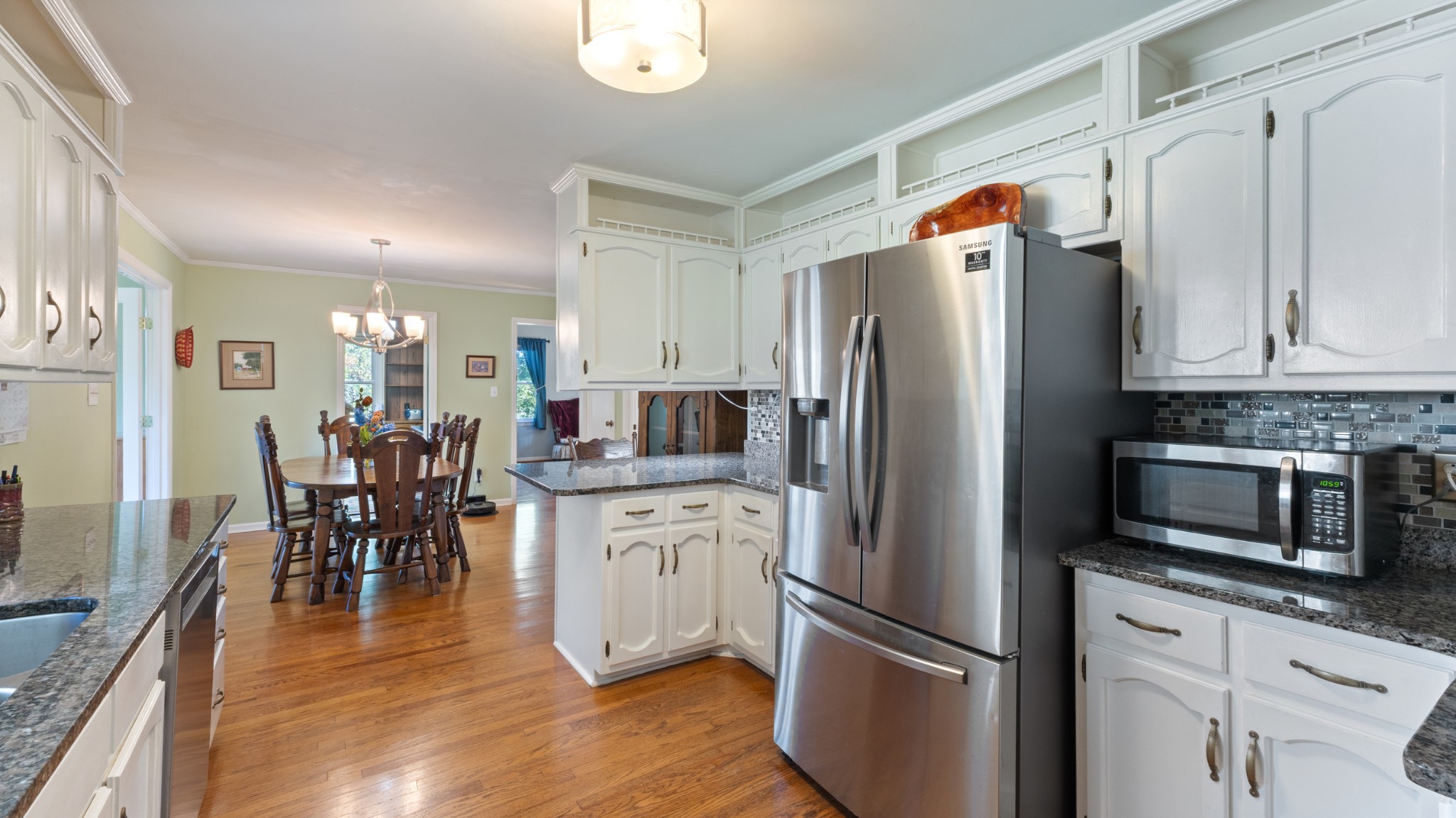 7 Scott Orchard Road Taft, TN 38488 - Photo 14 of 50 a kitchen with stainless steel appliances granite countertop a refrigerator and microwave