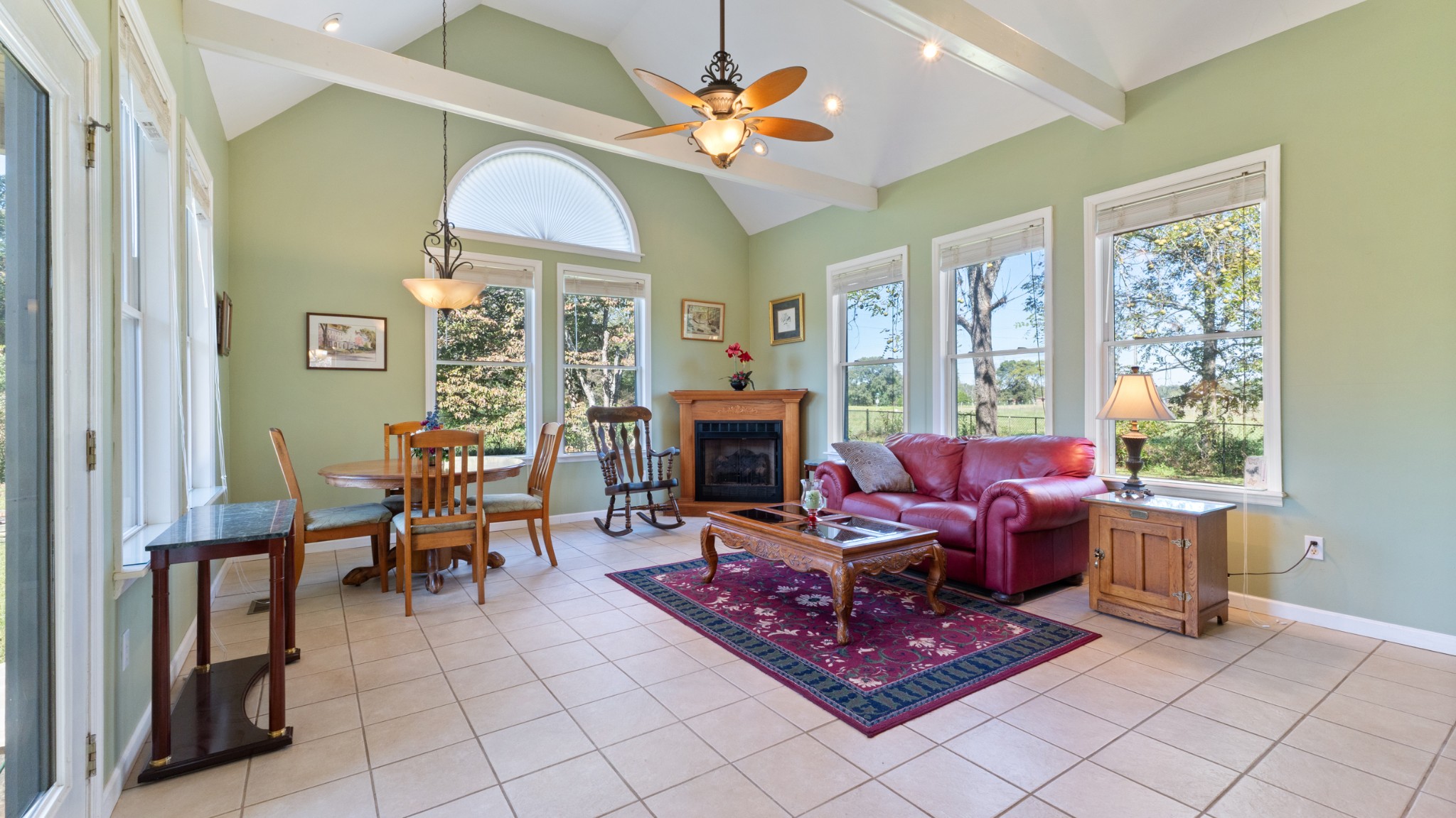 7 Scott Orchard Road Taft, TN 38488 - Photo 21 of 50 a living room with furniture a fireplace and a large window
