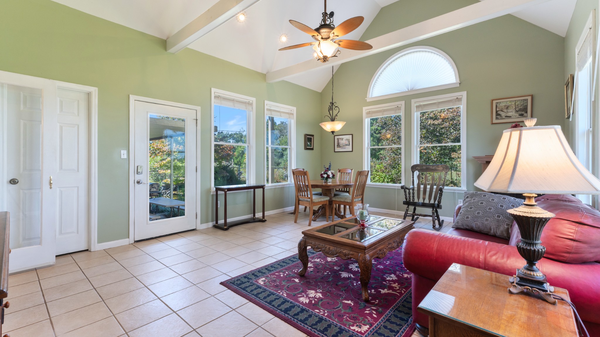 7 Scott Orchard Road Taft, TN 38488 - Photo 22 of 50 a living room with furniture a window and a chandelier