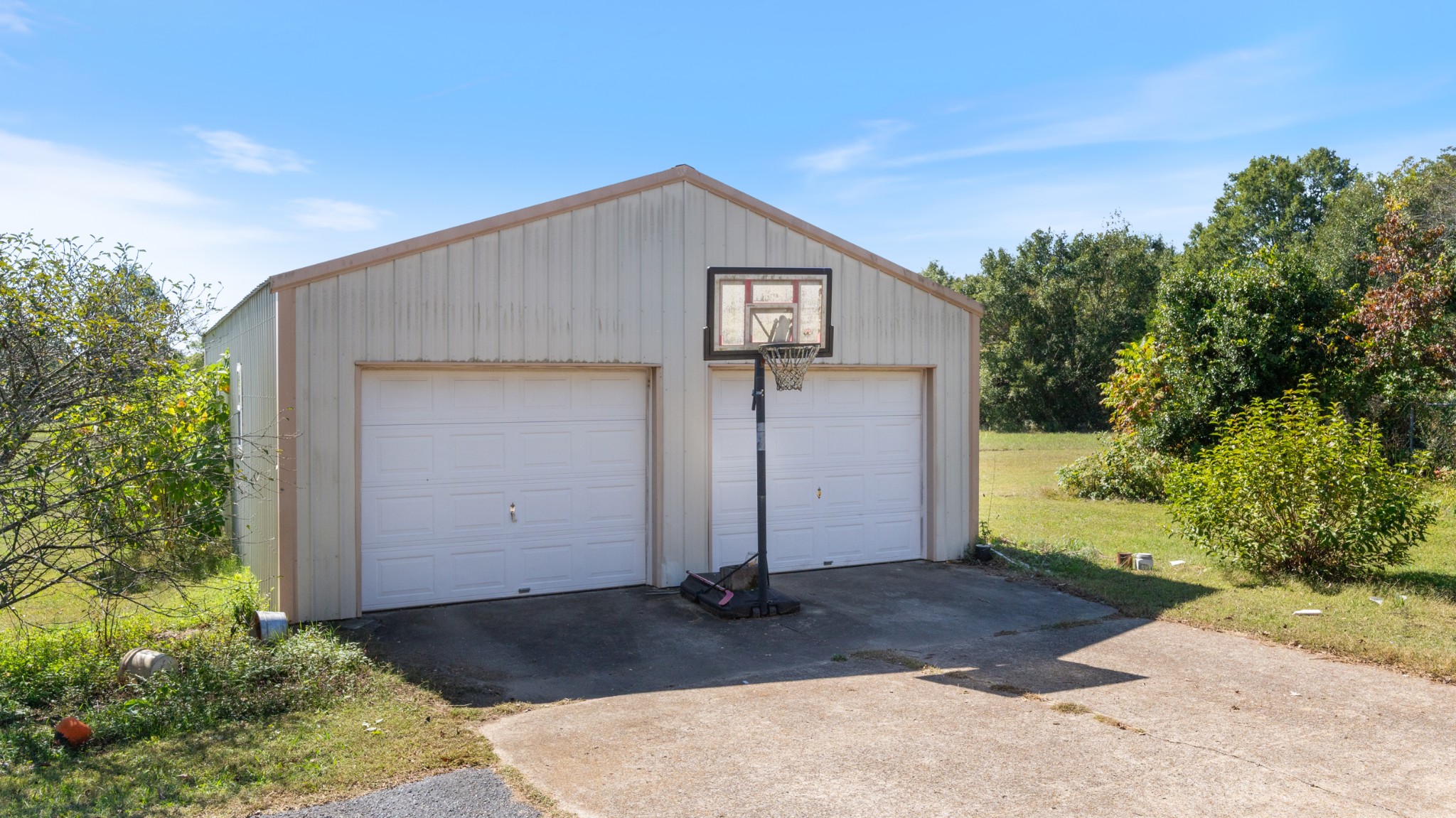 7 Scott Orchard Road Taft, TN 38488 - Photo 25 of 50 a front view of a house with garden