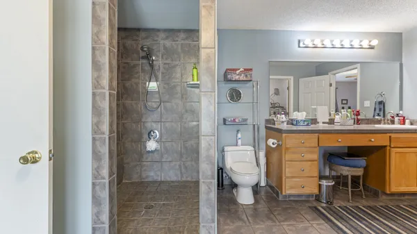 a bathroom with a tub and a window