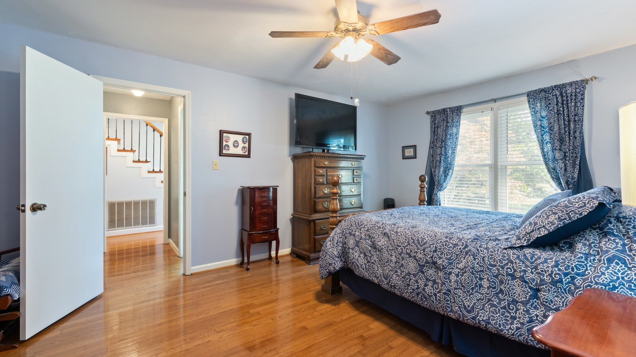 7 Scott Orchard Road Taft, TN 38488 - Photo 40 of 50 a bedroom with a bed and a flat screen tv