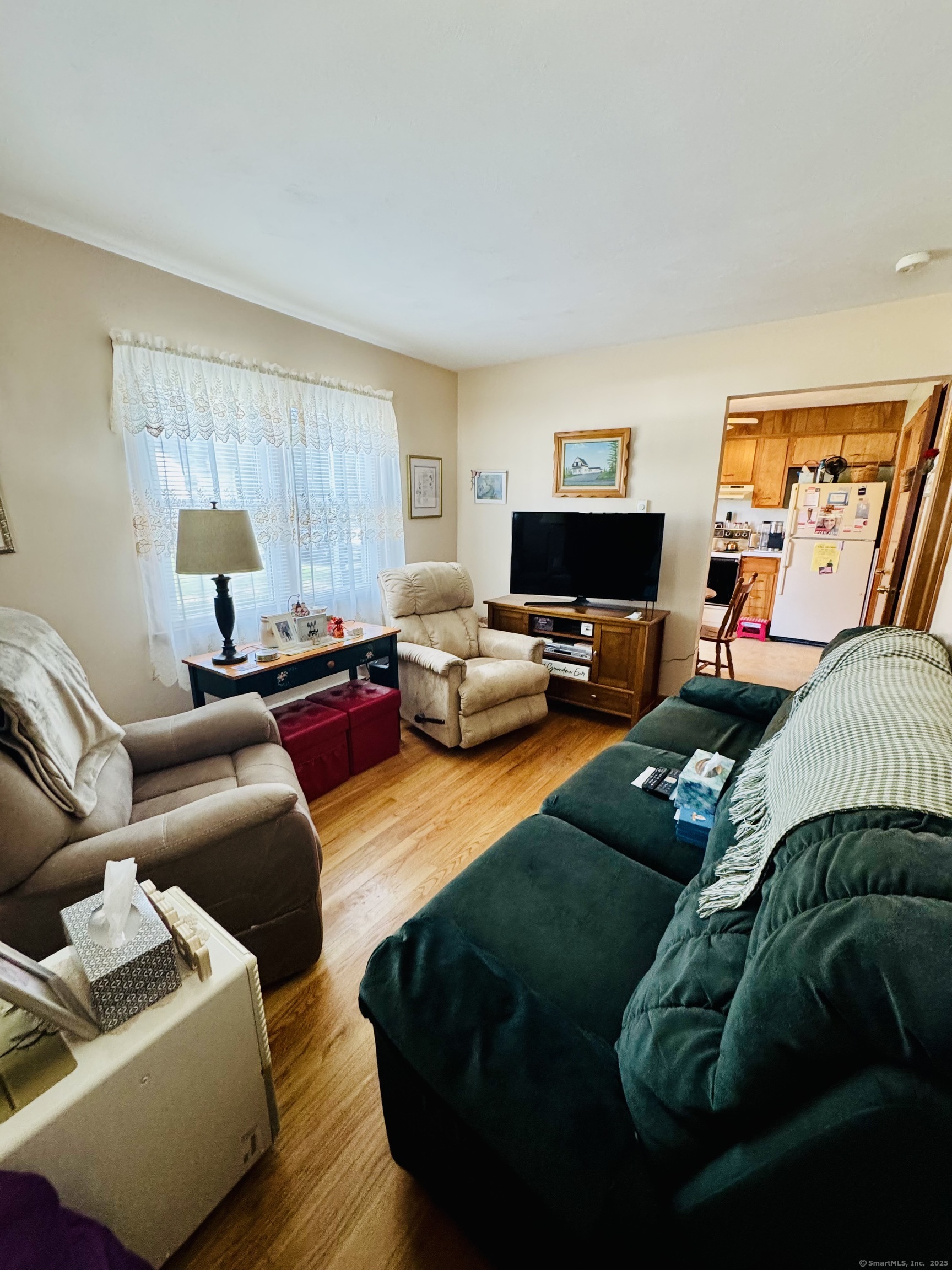 41 Pardee Street Bristol, CT 06010 - Photo 5 of 7 a living room with furniture and a flat screen tv