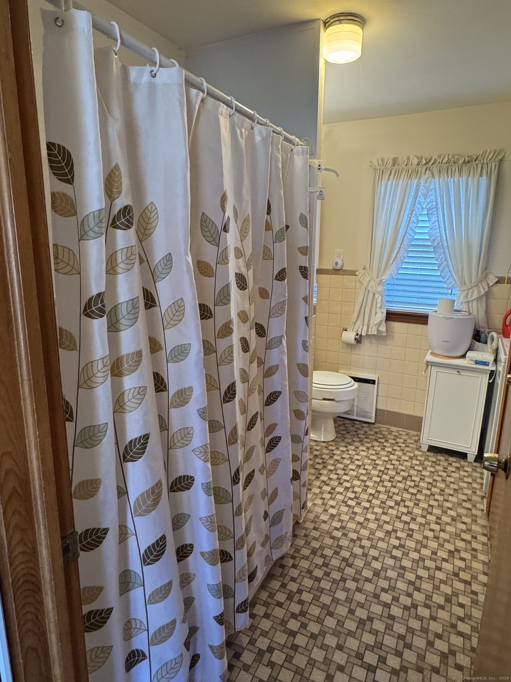 41 Pardee Street Bristol, CT 06010 - Photo 7 of 7 a bathroom with a toilet and a shower