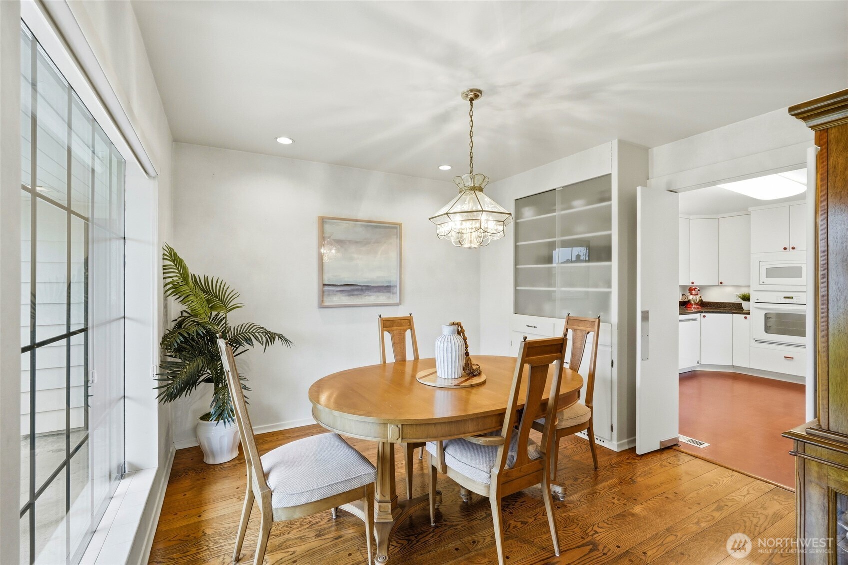 456 View Ridge Drive Everett, WA 98203 - Photo 15 of 40 a view of a dining room with furniture and chandelier