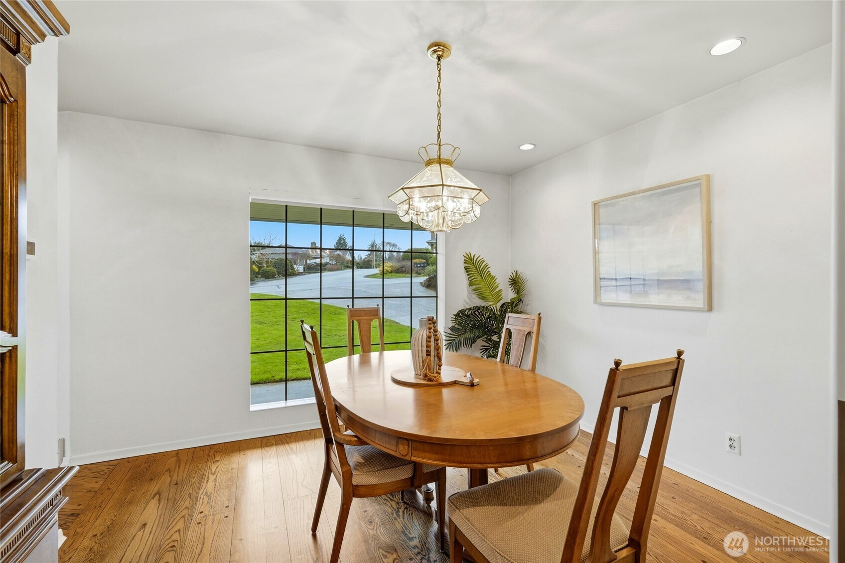 456 View Ridge Drive Everett, WA 98203 - Photo 16 of 40 a view of a dining room with furniture window and wooden floor