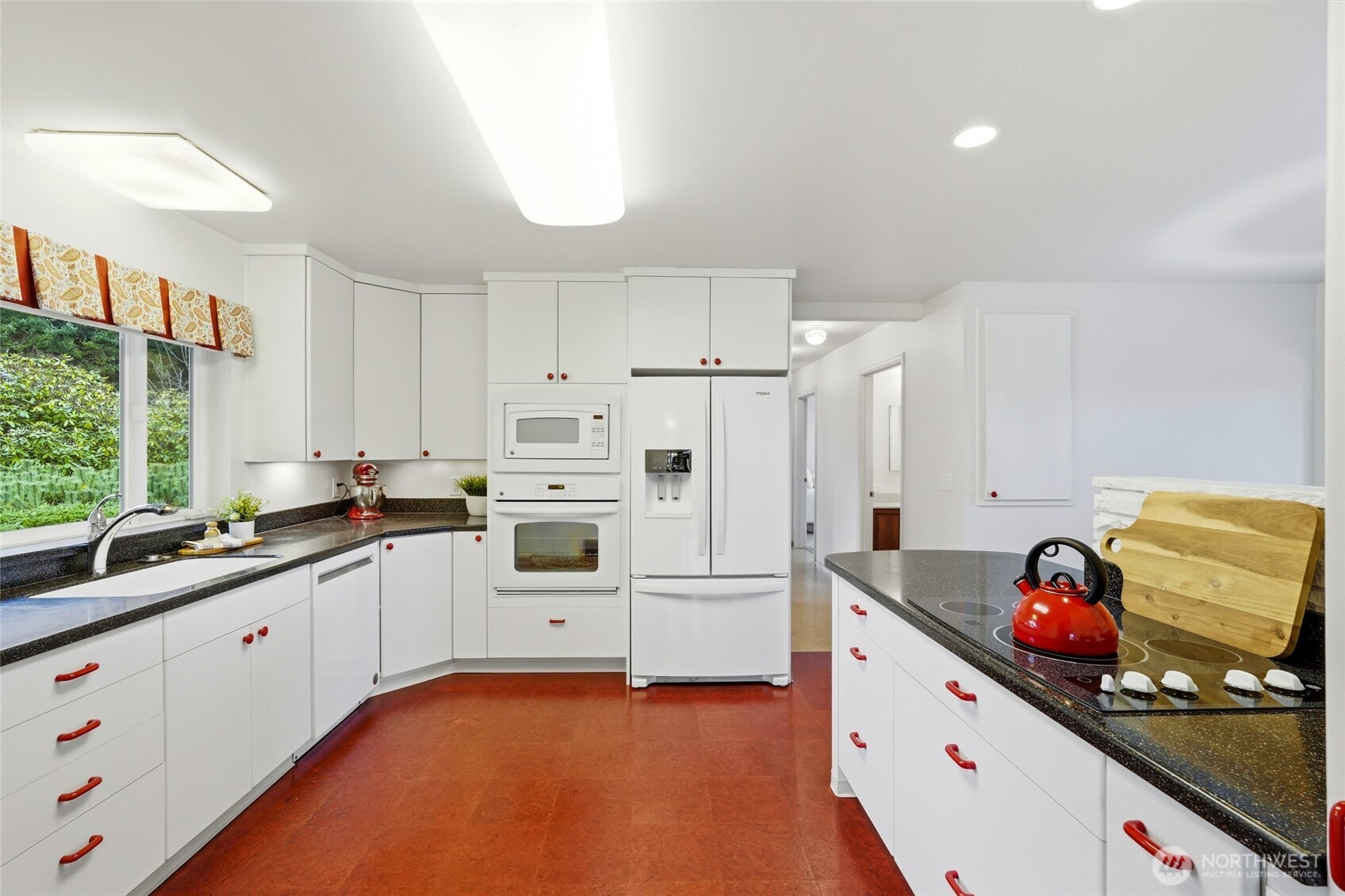 456 View Ridge Drive Everett, WA 98203 - Photo 17 of 40 a kitchen that has a lot of white cabinets and stainless steel appliances
