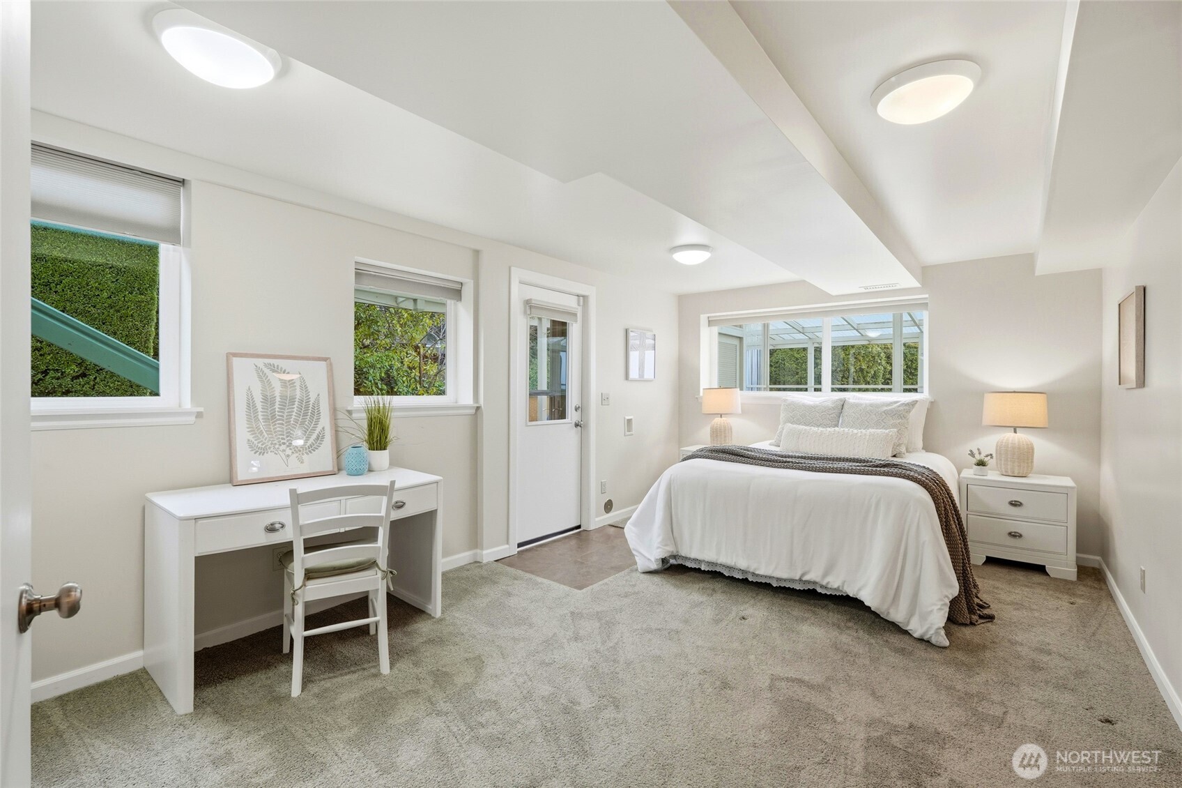 456 View Ridge Drive Everett, WA 98203 - Photo 32 of 40 a bedroom with a bed and a table chair