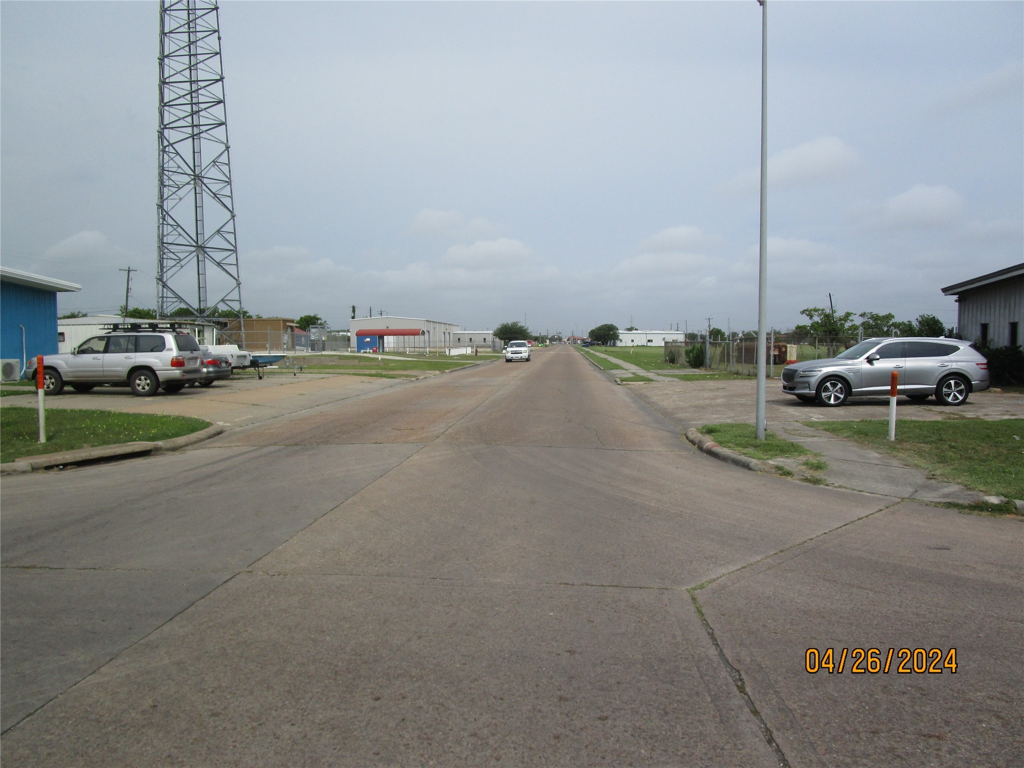 0 Skinner Street Freeport, TX 77541 - Photo 11 of 13 a view of a city street with tall buildings